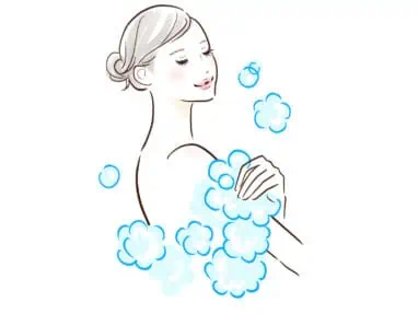 LUSHシャワースクラブ使い方　身体を洗う女性